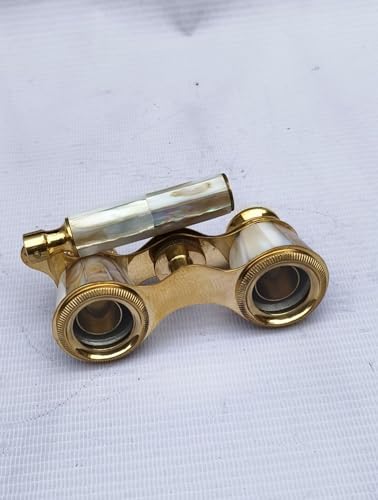 Compact generic brass opera glasses folded down demonstrating its portable size alongside a protective velvet storage case.