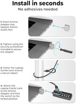 Universal laptop security locking system protecting a slim laptop on a coffee shop table.