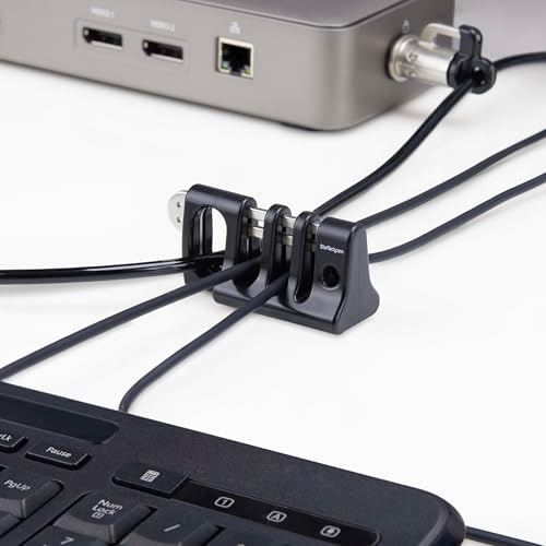 Complete StarTech peripheral cable organizer lock package including adhesive tape and modular metal trap.