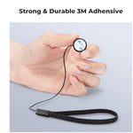 Vacuum packed microfiber cleaning cloth next to elastic camera lens cap keepers