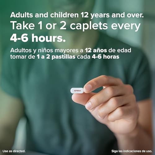 Close up of easy to swallow coated caplets of Bayer 500mg aspirin medicine