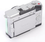 Underside view highlighting the protective silicone padding designed to guard camera hot shoe contacts.