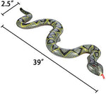 Three pieces of thirty nine inch blow up snakes arranged on grass as garden reptile decor
