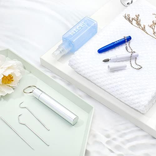 Portable stainless steel dental kit with keychain case.