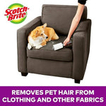 Close up of Scotch-Brite extra sticky adhesive sheets picking up cat fur from a sofa.