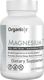 Close up of Organixx Magnesium Glycinate Supplement bottle showing directions and ingredient safety.