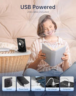 Tripole compact USB fan plugged into a laptop side port