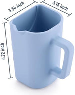 Water draining from the contoured rim of the JOY ANAN baby shampoo washing mug.