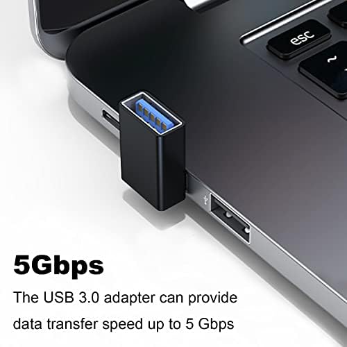 Compact USB 3 point 0 right angle adapter connected to a laptop side port