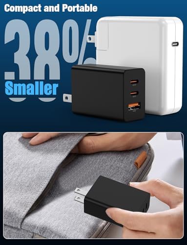 Hzevn super fast charging block positioned next to a laptop to demonstrate its travel-friendly size.