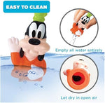 Toddler hands holding colorful Mickey Mouse and Pluto plastic finger toys for learning