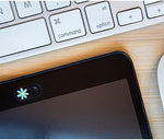 VeekyVicky ultra thin camera cover slide attached to a sleek smartphone camera lens