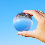 DSJUGGLING seventy millimeter contact juggling ball being balanced on a hand for isolation tricks