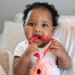 Dr. Brown's silicone teether showing flexibility and durability