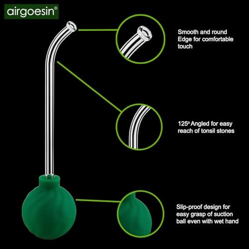 Stainless steel tonsil stone pick with protective cap for safe removal.