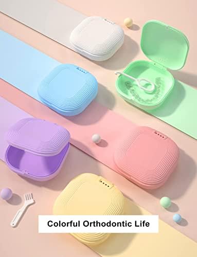 Yellow HEMILAB orthodontic kit showing the precise placement of clear aligners inside the secure silicone liner
