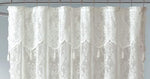 Warm Home Designs boho shower curtain installed in a vintage styled bathroom setup