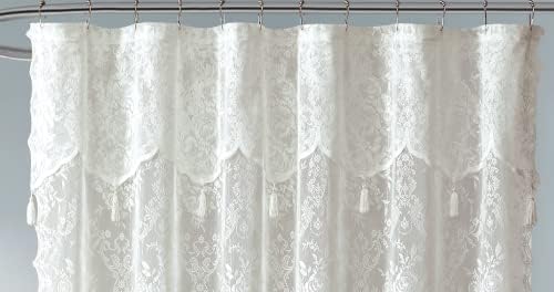 Warm Home Designs boho shower curtain installed in a vintage styled bathroom setup