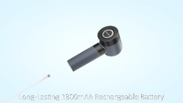 BEAUTURAL portable pilling remover used on a living room sofa cushion.