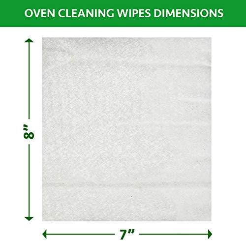 Close up of a person using a Cadie orange oil wipe to clean a microwave interior