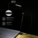 Bubosper night work light demonstrating targeted glare free illumination on a notebook.