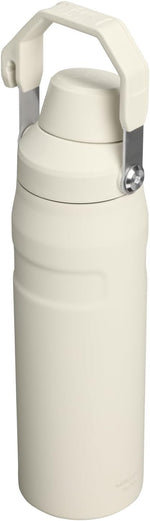Cream colored Stanley leakproof travel bottle with integrated cap holder handle