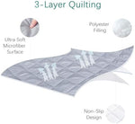 Grey Biloban toddler bed cover showing the durable stretchy elastic border for a secure mattress fit.