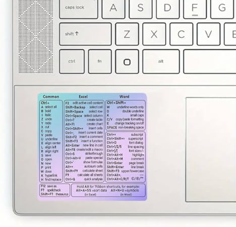 MAKTEM fade resistant keyboard reference guide sticker applied cleanly next to a laptop trackpad.