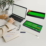 Miniature putting green surface with flag and golf balls