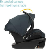 Rear perspective of the premium infant car seat highlighting the ergonomic contoured carrying handle.
