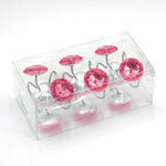 Polished chrome finished shower curtain hooks showing diamond emblem details.