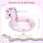 Child using MoKo unicorn swim ring in swimming pool