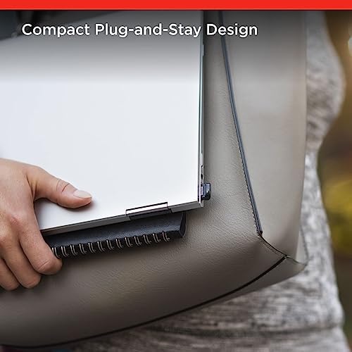 SanDisk 128GB ultra compact black pen drive plugged into a laptop side port