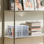 Rainmae transparent shelf organizer holding twenty-six disc cases.
