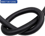 Black three quarter inch split wire sleeve organizing computer and television cords at home.