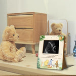 Winnie the Pooh baby shower sign displayed as tabletop nursery decor