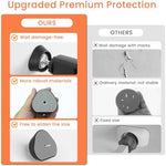Black wall protection pads installed between a pressure mounted dog gate and a white wall.