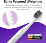Close up view of the super soft bristles on the pink electronic teeth whitening toothbrush.