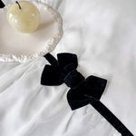 Soukechy white ruffled bedding arranged beautifully under romantic bedroom lighting