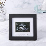IHEIPYE premium black pine wood ultrasound picture frame displayed on a nursery shelf