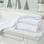 Close up view of Gerber washcloth fabric texture and stitched edges