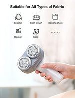 VASSON lint remover with detached lint container and cleaning brushes.