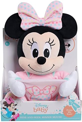 Minnie Mouse hide and seek interactive doll being held by a toddler during playtime