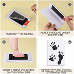 Detailed black baby footprint and dog paw print stamped beautifully on white imprint cards