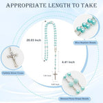 Top perspective of the light blue ceramic keepsake container showing the elegant silver cross handle