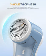 Beautural fabric shaver being used on a sofa cushion to remove furniture bobbles.