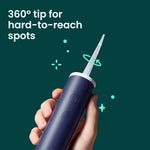 Close up of the Quip water flosser top-fill reservoir and adjustable pressure buttons.
