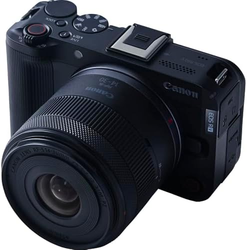 Canon compact vlog camera with articulated flip screen open for recording