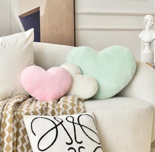 Soft faux fur heart shaped throw pillow close up