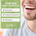 Eco friendly oral hygiene display of compostable bamboo charcoal floss picks next to sustainable packaging